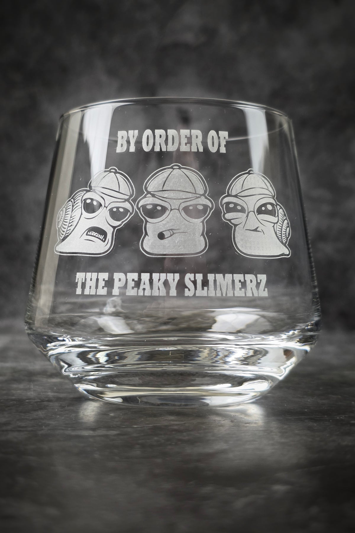 Close-up of the Peaky Slimerz engraving on a 300ml crystal glass