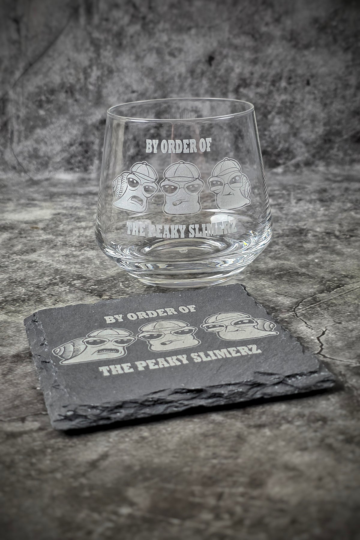 Empty Peaky Slimerz crystal glass and matching engraved slate coaster